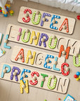 - Custom Wooden Name Puzzle with Pegs – Colourful Letters Baby Stork