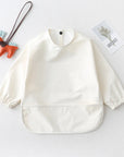 Cream - Solid Colour Baby Feeding Smock – Waterproof Easy-Clean Long Sleeve Bib | Baby Stork Baby Stork Bibs