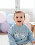- Baby “One” Knit Birthday Sweater Baby Stork