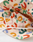 - Reversible Cotton Bucket Hat – “Cute” Print Baby Stork