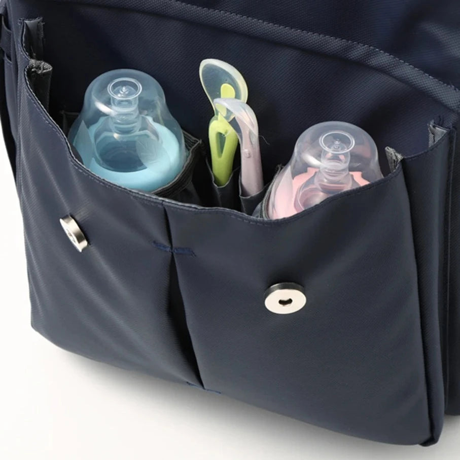 - Fun Cartoon Designed Diaper Backpack - Large Capacity and Waterproof Baby Stork Diaper Wet Bags