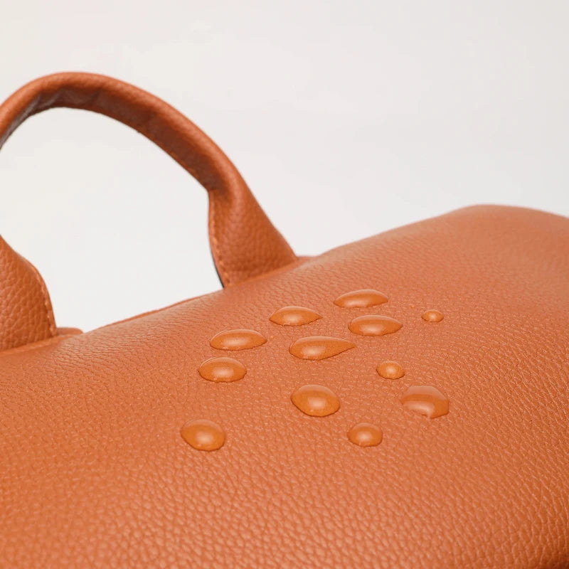 - Luxury Vegan Leather Diaper Bag - Multifunctional and Stylish Baby Stork Diaper Wet Bags