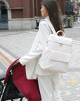 - Luxury Vegan Leather Diaper Bag - Quilted Design with large capacity and accessories. Baby Stork Diaper Wet Bags