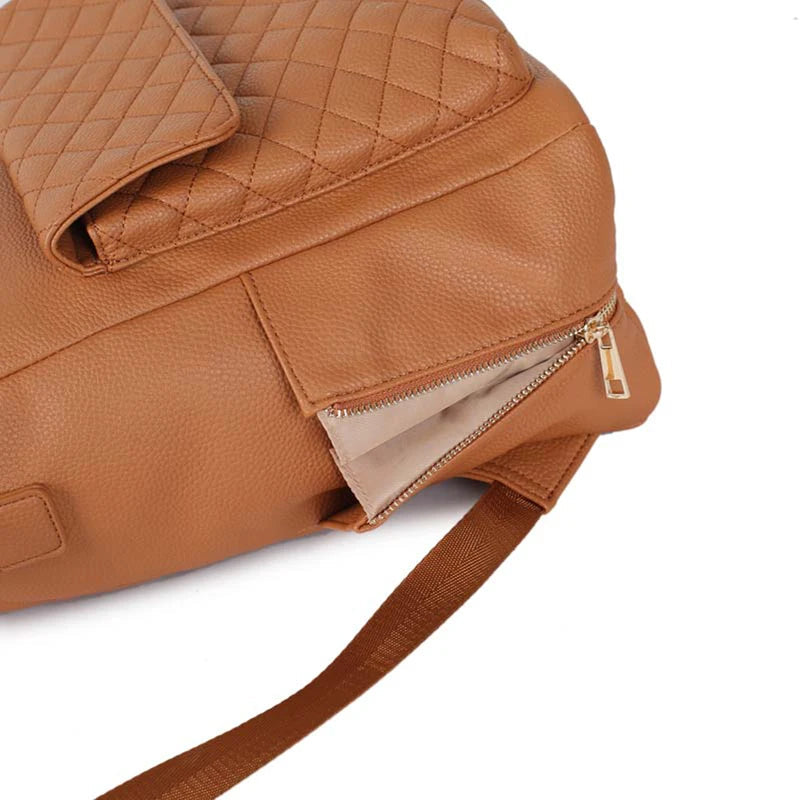 - Luxury Vegan Leather Diaper Bag - Quilted Design with large capacity and accessories. Baby Stork Diaper Wet Bags