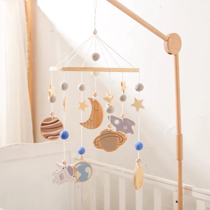 - Cosmic Explorer Nursery Mobile with Wooden Space Figures Baby Stork Baby Mobile