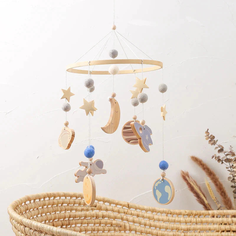 - Cosmic Explorer Nursery Mobile with Wooden Space Figures Baby Stork Baby Mobile