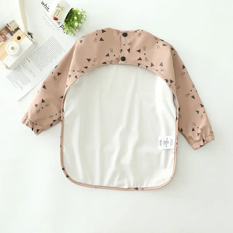 - Patterned Baby Smock Bib – Waterproof Long Sleeve Feeding & Playtime Bib | Baby Stork Baby Stork Bibs