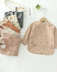 - Ultimate Baby Smock Bib - Waterproof, Long Sleeves & Catch-All Pocket Baby Stork Bibs