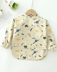 Dinosaur - Ultimate Baby Smock Bib - Waterproof, Long Sleeves & Catch-All Pocket Baby Stork Bibs