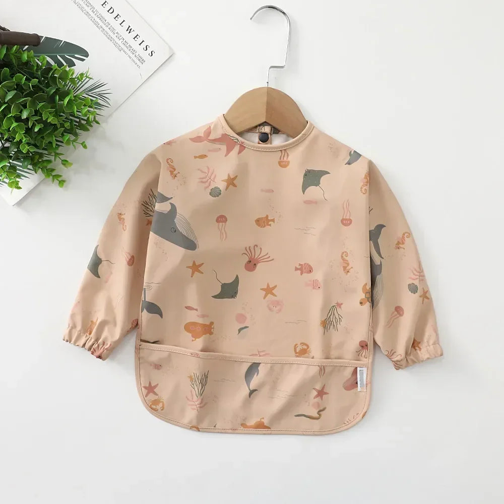 Sea Creatures (Brown) - Patterned Baby Smock Bib – Waterproof Long Sleeve Feeding & Playtime Bib | Baby Stork Baby Stork Bibs