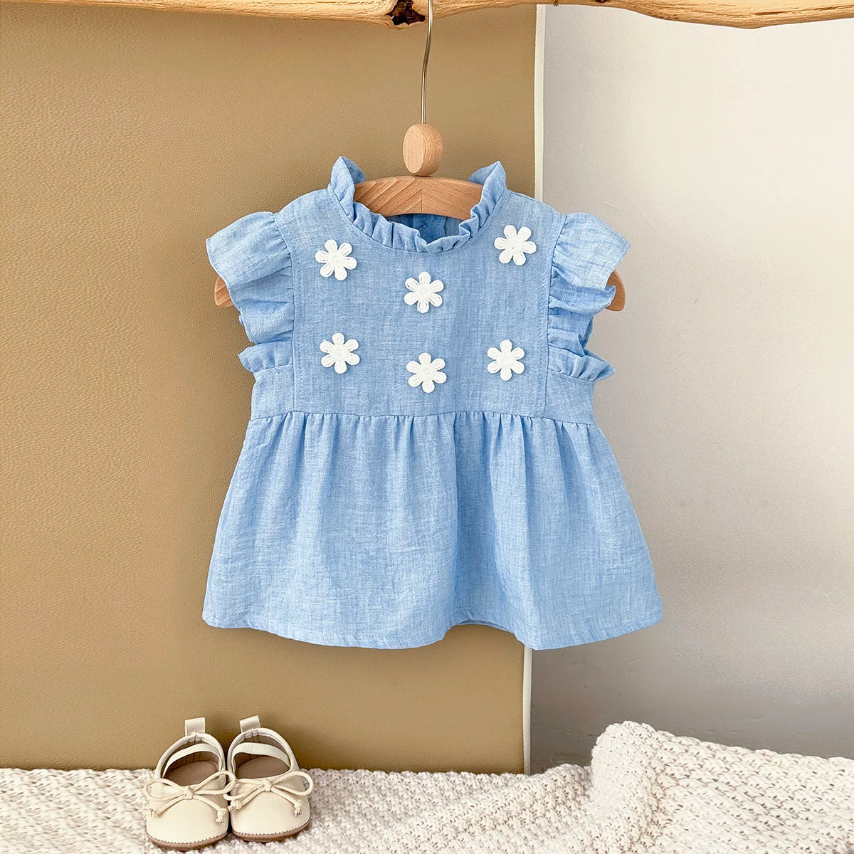 - Blue Daisy Flutter Dress – Sweet Ruffle Detail Baby Stork