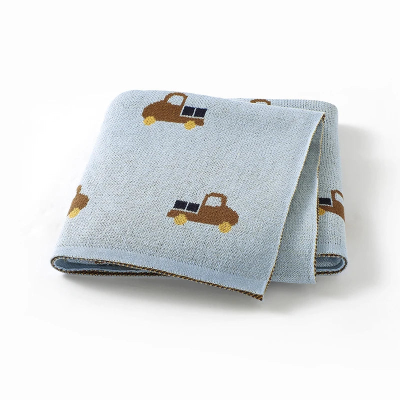 - Truck Pattern Baby Blanket – 90 × 70 cm | Soft Acrylic | 6 Colours Baby Stork