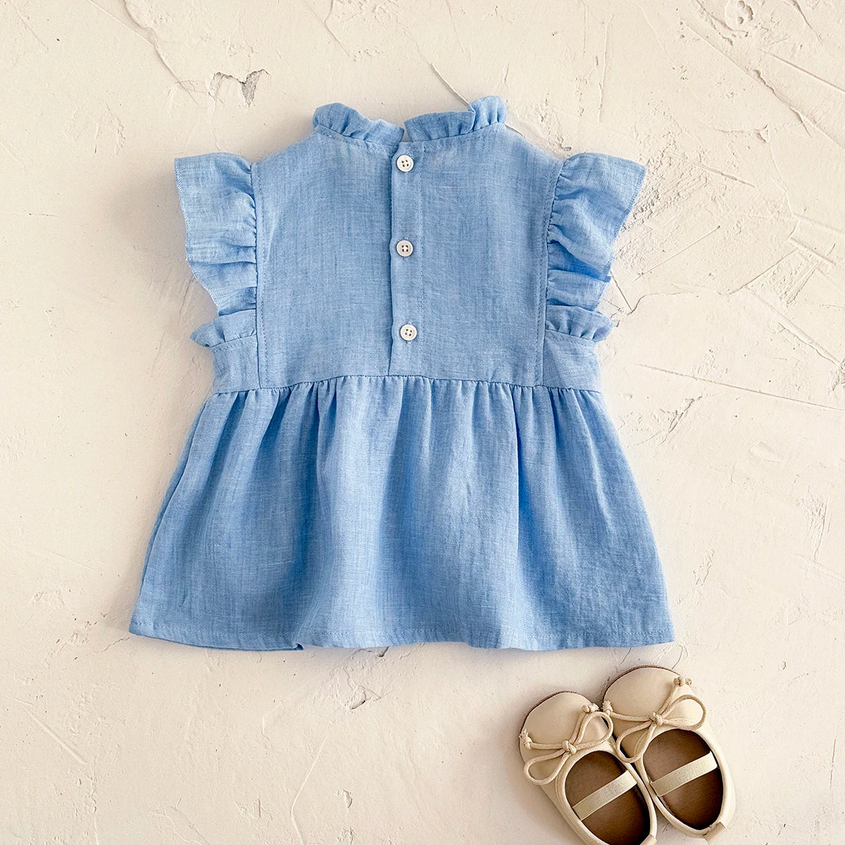 - Blue Daisy Flutter Dress – Sweet Ruffle Detail Baby Stork