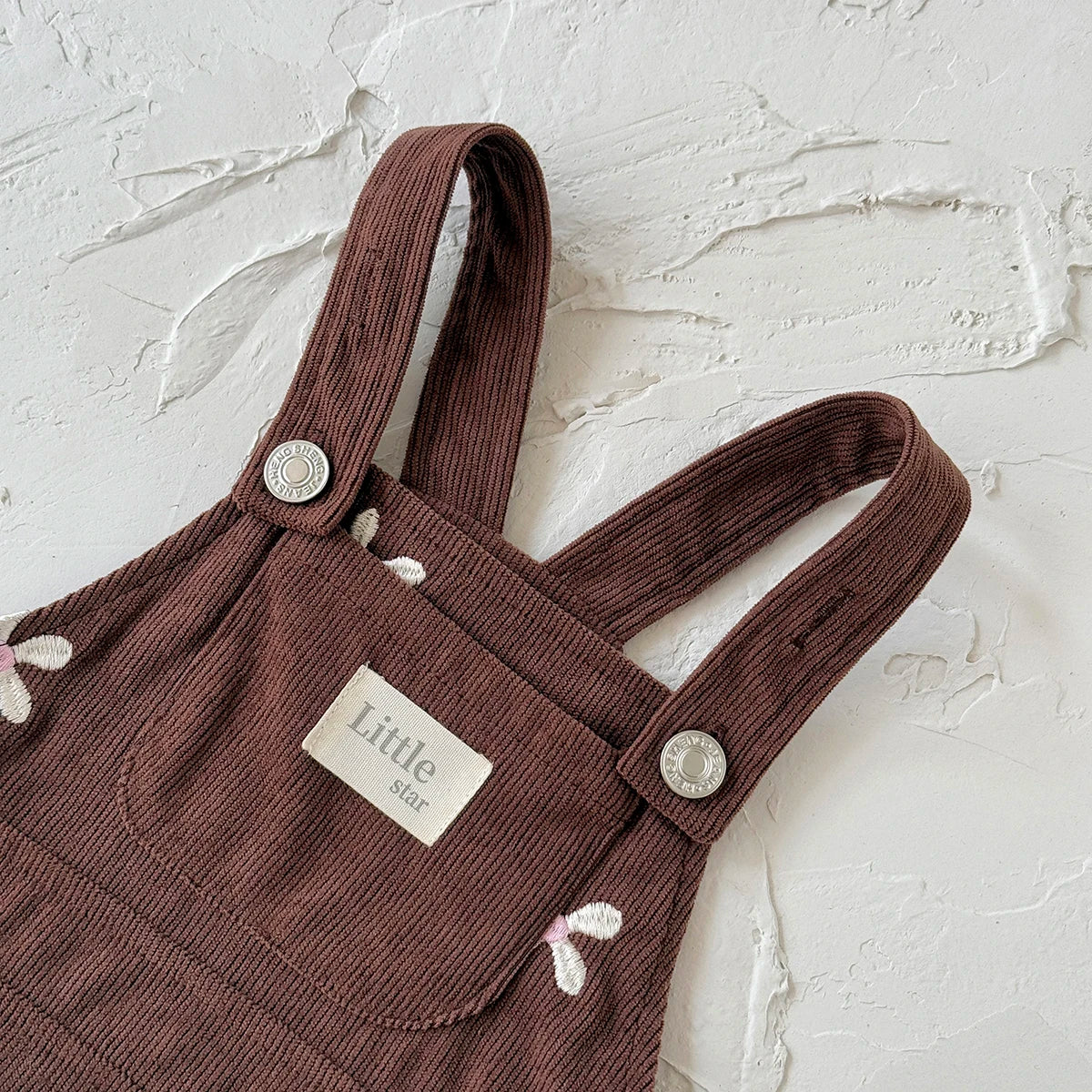 - Chocolate Corduroy Overall Dress – Embroidered Daisy Pinafore Baby Stork