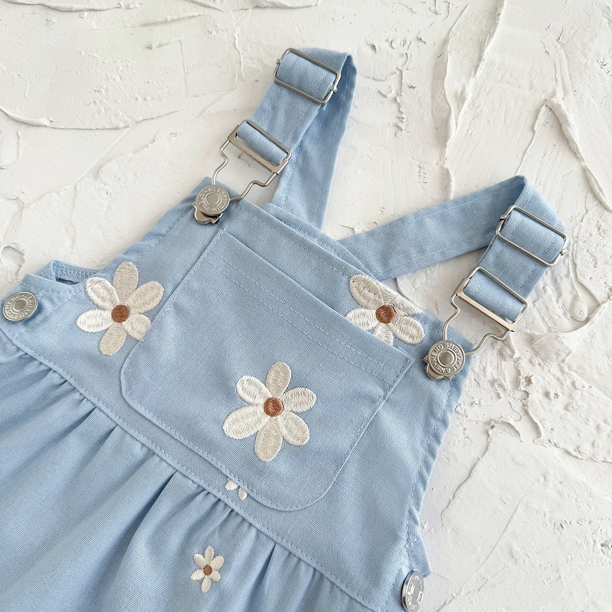 - Blue Daisy Overall Dress Baby Stork