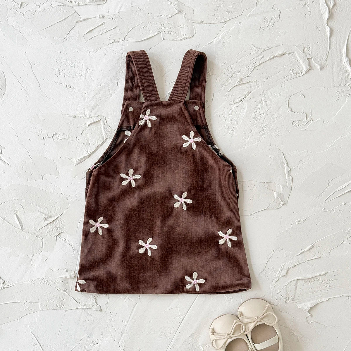 - Chocolate Corduroy Overall Dress – Embroidered Daisy Pinafore Baby Stork
