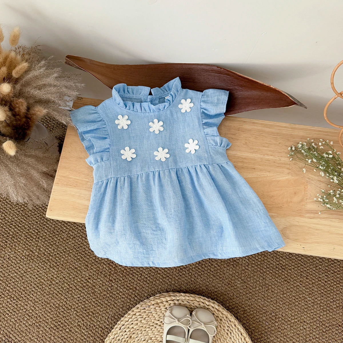 - Blue Daisy Flutter Dress – Sweet Ruffle Detail Baby Stork