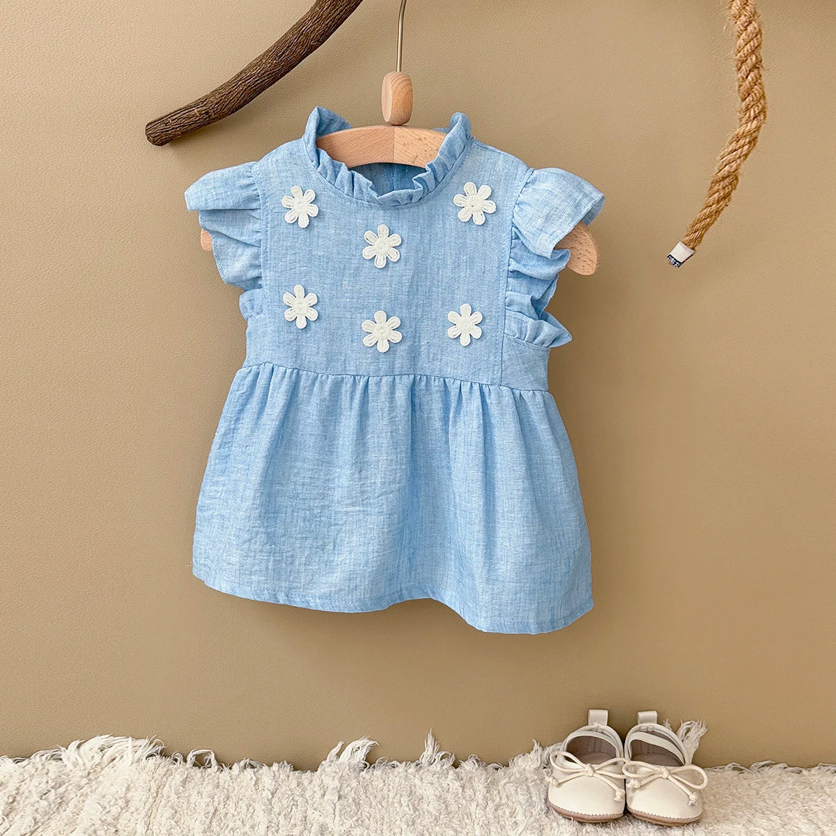 - Blue Daisy Flutter Dress – Sweet Ruffle Detail Baby Stork