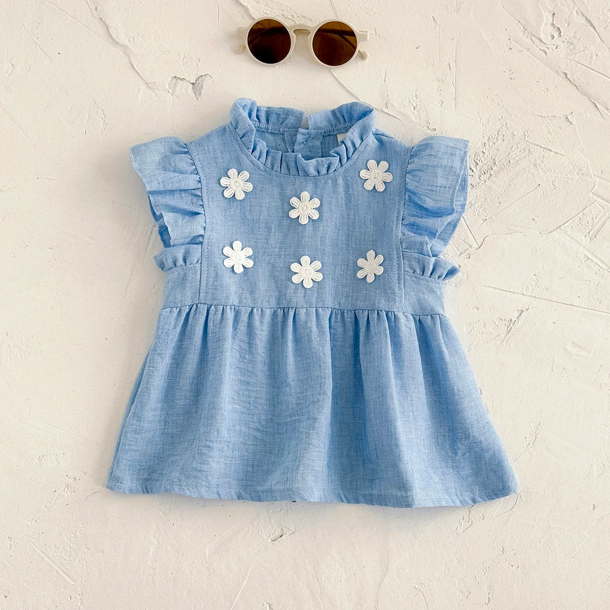 - Blue Daisy Flutter Dress – Sweet Ruffle Detail Baby Stork