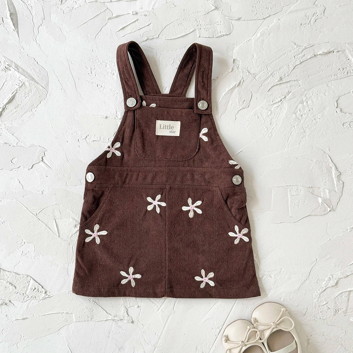 - Chocolate Corduroy Overall Dress – Embroidered Daisy Pinafore Baby Stork