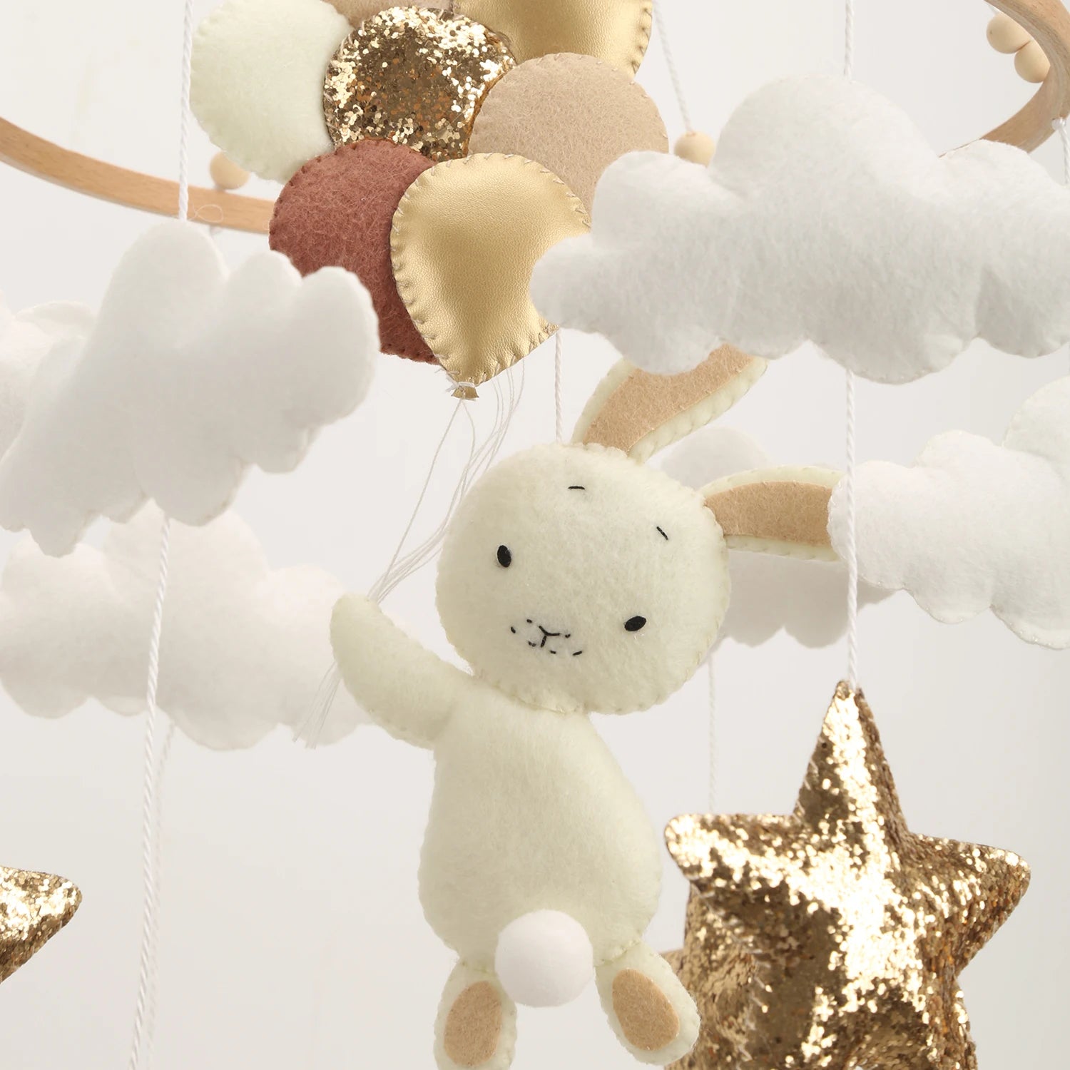 - Bunny & Stars BOHO Baby Mobile – White Clouds, Gold & Brown Stars Baby Stork