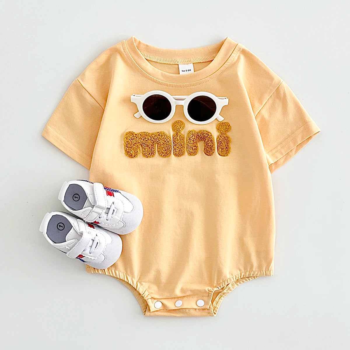 - Mini Textured Baby Romper – Soft Cotton Blend Bodysuit Baby Stork