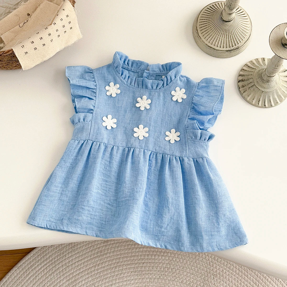 - Blue Daisy Flutter Dress – Sweet Ruffle Detail Baby Stork