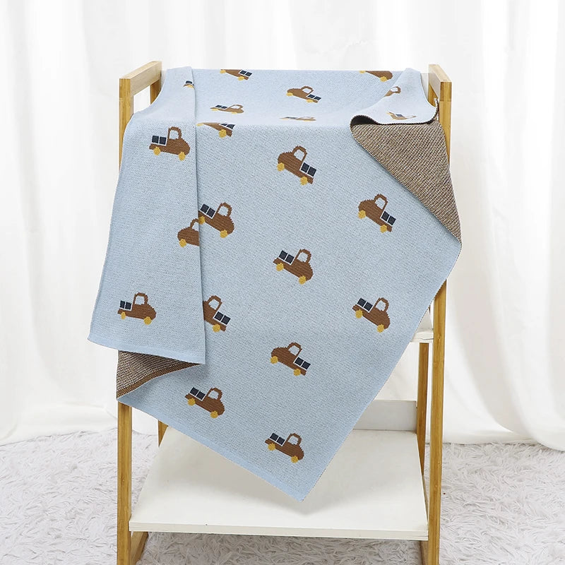 - Truck Pattern Baby Blanket – 90 × 70 cm | Soft Acrylic | 6 Colours Baby Stork