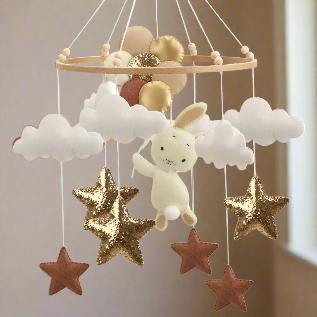 - Bunny & Stars BOHO Baby Mobile – White Clouds, Gold & Brown Stars Baby Stork