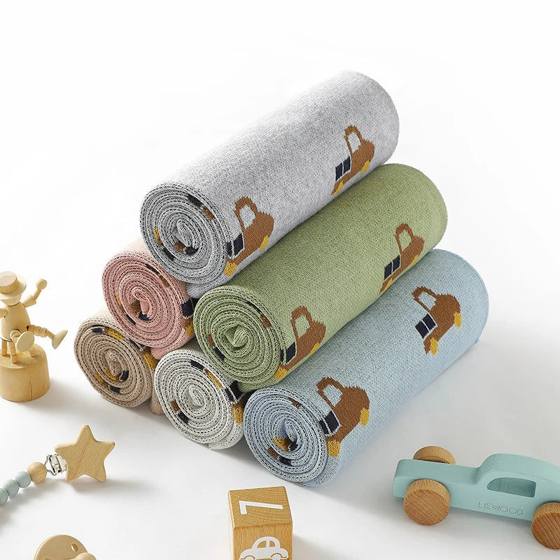 - Truck Pattern Baby Blanket – 90 × 70 cm | Soft Acrylic | 6 Colours Baby Stork