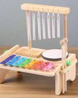- Kids Musical Instrument Set - 4-in-1 Drum, Xylophone, Wind Chime, and Scraper Baby Stork Musical Toy