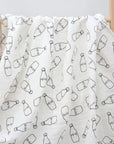 - Organic Cotton Swaddle - Milk Bottle Storkke Swaddling & Receiving Blankets